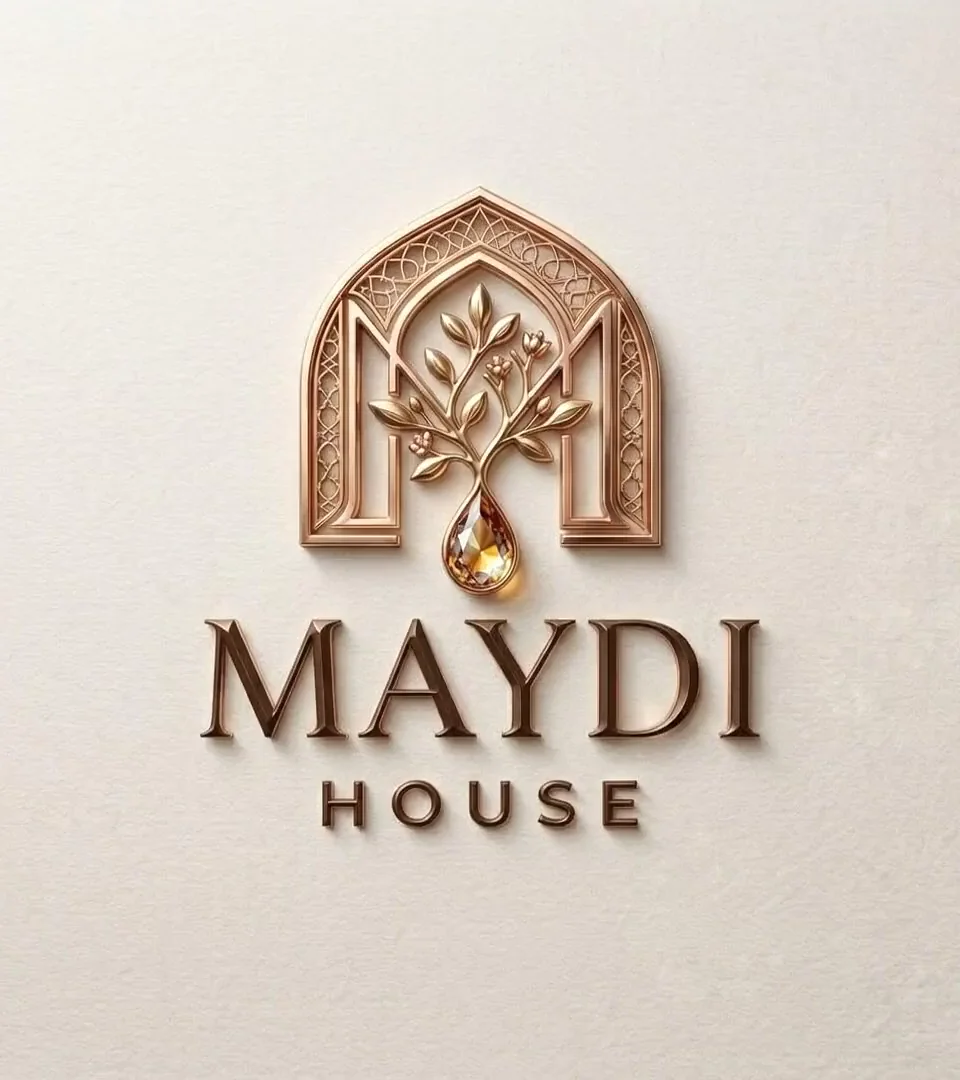 The Maydi House logo: a pointed arch with an M, a tree and a drop of amber resin